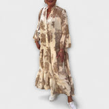 Nerina - Beiges Maxikleid mit Aquarellmuster