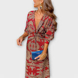 Oriana - Blaues Kleid mit goldenem Muster