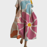 Pastellkleid mit grosser Blüte
