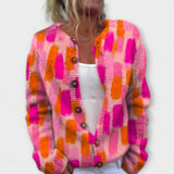 Flora - Pinker Strickcardigan mit buntem Print